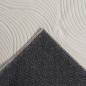 Preview: Schöner warmer Teppich mit elegantem Wellenmuster in creme