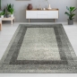 Preview: Wohnzimmerteppich Designer Teppich modern kurzflor vintage seitlich gekettelt in grau creme