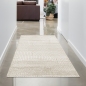 Preview: Moderner Teppich mit geschwungenem Muster in beige