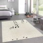 Preview: Kinderzimmer Teppich Spielzimmer glückliche Giraffe weich in beige creme schwarz