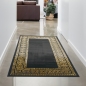 Mobile Preview: Teppich Wohnzimmer mit Bordüre im Mäander Muster schwarz gold