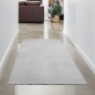 Preview: Grauer Teppich mit gebogenen Linien und glänzenden Fäden