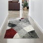 Mobile Preview: Abstrakter Wohnzimmer Teppich mit modernem marmorierten Wellen Rauten Design in grau rot - pflegeleicht
