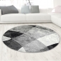 Preview: Abstrakter Wohnzimmer Teppich mit modernem marmorierten Wellen Rauten Design in grau schwarz - pflegeleicht