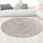 Preview: Teppich beige Hasenfell-Optik elegant weich mit feinem Schimmer modern