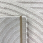 Preview: Moderner Wohnzimmerteppich mit elegantem Kreismuster in creme