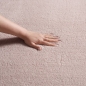 Preview: Design Teppich blush rosa sanft mit moderner Wellenform