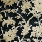 Mobile Preview: Orientalischer Teppich Wohnzimmer mit Blumenmotiv in schwarz gold