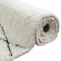 Preview: Nordisches Flair: Zeitloser Teppich mit elegantem Rautenmuster in Weiß und Schwarz für stilvolles Wohnambiente