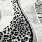 Preview: Designteppich Leopardenmuster Grau Schwarz Creme für moderne Räume