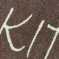 Preview: Moderner Küchenteppich mit Schriftmotiv und warmer Farbwirkung Braun
