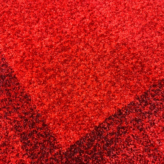 Preview: Teppich Wohnzimmer  Designer kurzflor Modern vintage seitlich gekettelt in rot Preview: Teppich Wohnzimmer  Designer kurzflor Modern vintage seitlich gekettelt in rot