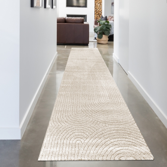 Moderner Teppich mit geschwungenem Muster in beige
