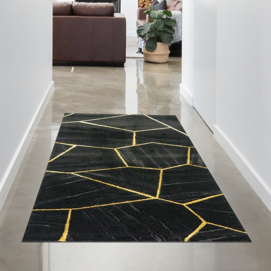 Teppich Wohnzimmer geometrisches Muster schwarz gold