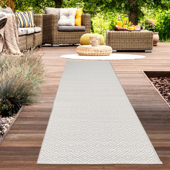 Stilvoller Outdoor-Teppich mit klassischem Rautenmuster in beige