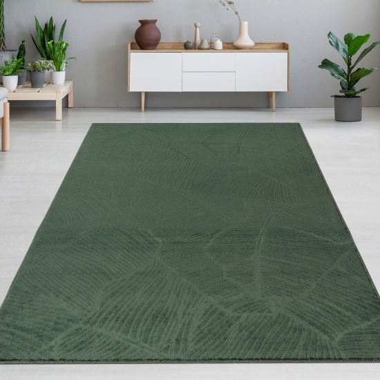 Schöner warmer Teppich mit elegantem Blättermuster in grün