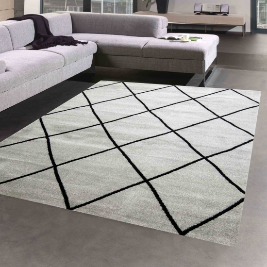 Skandinavischer Teppich Wohnzimmer Rautenmuster grau schwarz pflegeleicht