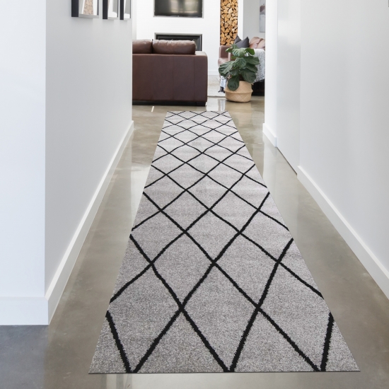 Skandinavischer Teppich Wohnzimmer Rautenmuster grau schwarz pflegeleicht