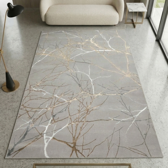 Moderner Designerteppich mit glänzenden Ästen abstrakt gold