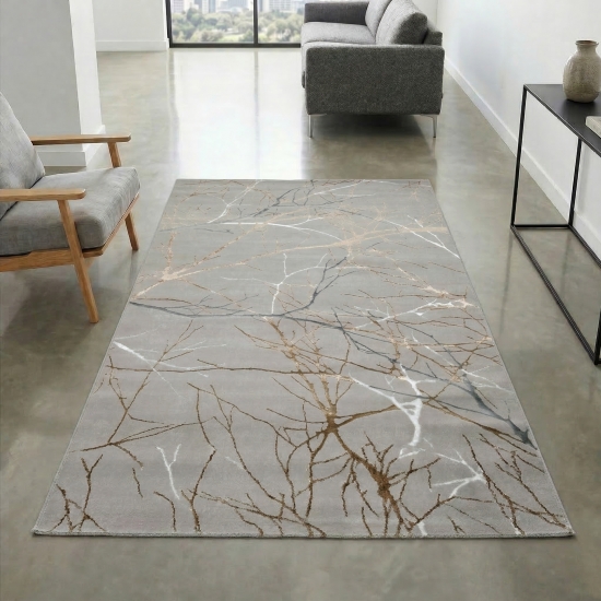 Preview: Moderner Designerteppich mit glänzenden Ästen abstrakt gold