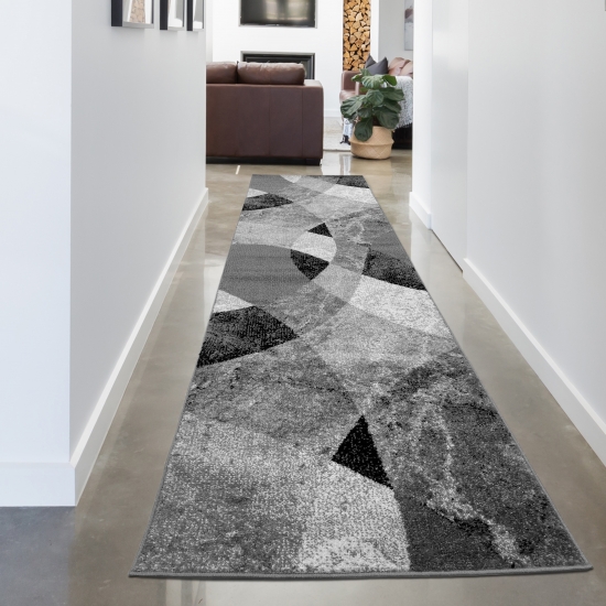 Abstrakter Wohnzimmer Teppich mit modernem marmorierten Wellen Rauten Design in grau schwarz - pflegeleicht