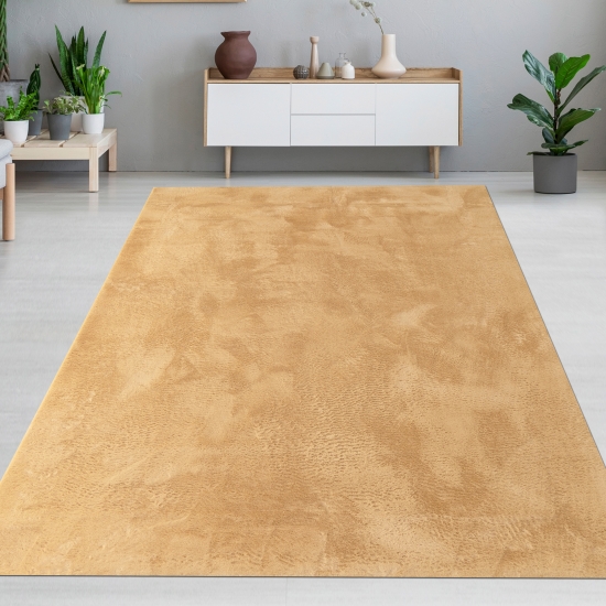 Teppich gold Hasenfell-Optik elegant weich mit feinem Schimmer modern