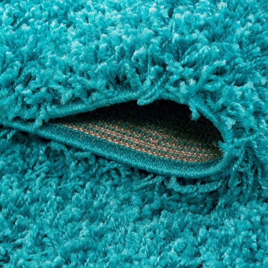 Moderner Hochflor Teppich in Aqua-Türkis – stilvolles Design und angenehme Haptik