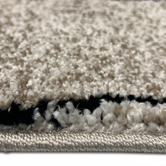 Design Teppich Beige Linienmuster elegant modern Wohnbereich stilvoll