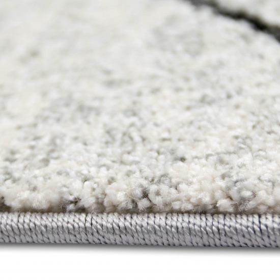 Design Teppich Creme Grau Rauten modern elegant Wohnbereich stilvoll