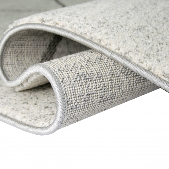 Design Teppich Creme Grau Rauten modern elegant Wohnbereich stilvoll