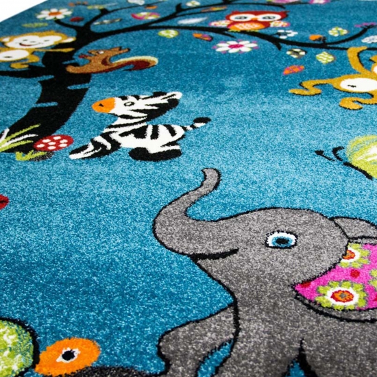 Teppich mit vielen Tiermotiven | in blau | Kinderfreundlich