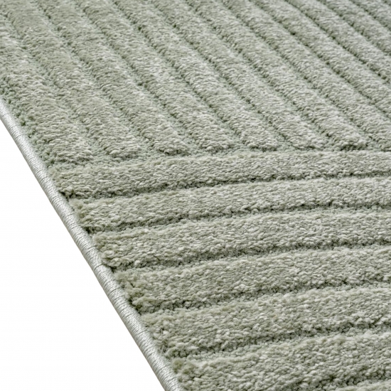 Designteppich grün mit Relieflinien modern pflegeleicht strukturiert