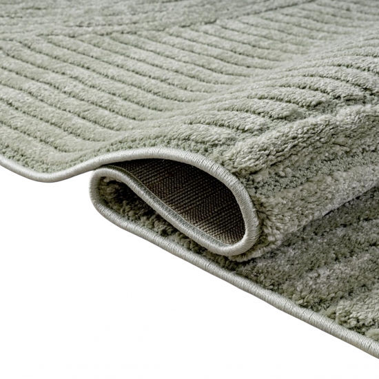 Designteppich grün mit Relieflinien modern pflegeleicht strukturiert