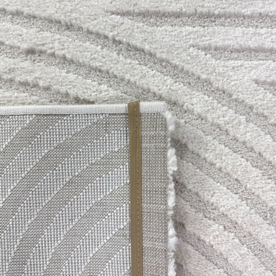 Moderner Wohnzimmerteppich mit elegantem Kreismuster in creme