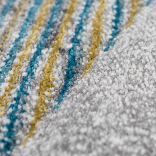 Abstrakter Teppich Wohnzimmer modernes gestreiftes Muster gold blau grau - pflegeleicht