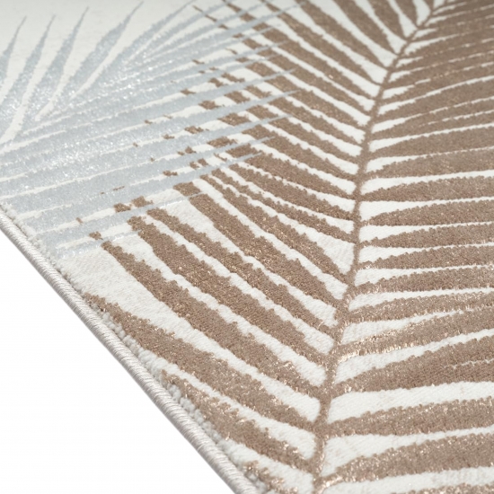 Moderner Creme Teppich mit Palmblattmuster und Glanzoptik