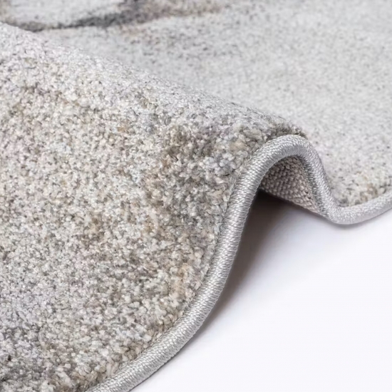 Design Teppich Grau Creme Steinstruktur modern elegant Wohnbereich