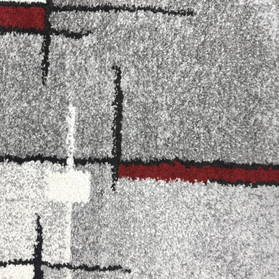 Designerteppich mit grafischem Muster – Grau, Rot & Weiß