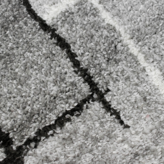 Designerteppich mit abstrakt quadratischem Muster in grau