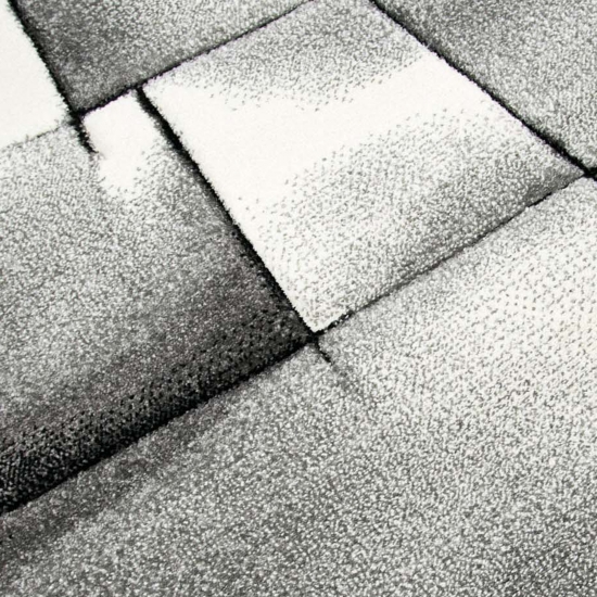 Moderner Teppich Kurzflor Wohnzimmerteppich Konturenschnitt karo abstrakt grau schwarz weiss