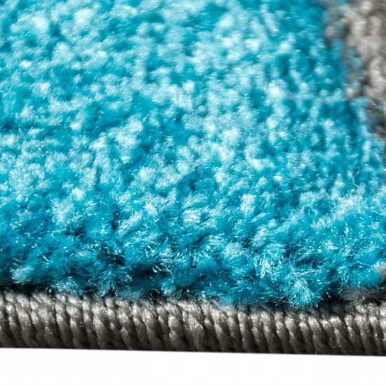 Moderner Teppich mit Wellenoptik | pflegeleicht | in türkis weiß & grau