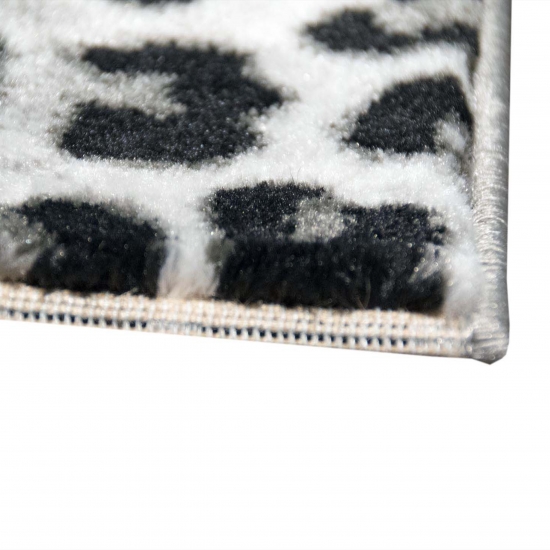 Designteppich Leopardenmuster Grau Schwarz Creme für moderne Räume