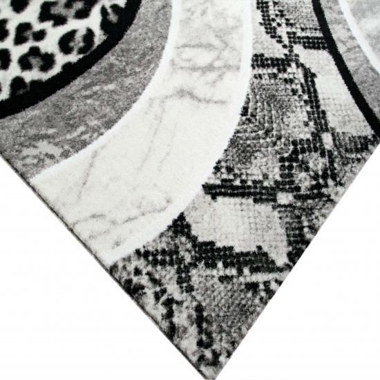 Preview: Designteppich Leopardenmuster Grau Schwarz Creme für moderne Räume
