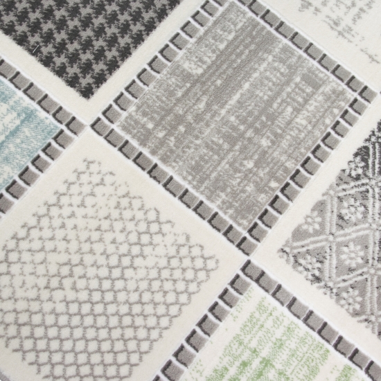 Preview: Designteppich mit grafischem Patch-Design Grau mit dezenten Farbakzenten Preview: Designteppich mit grafischem Patch-Design Grau mit dezenten Farbakzenten