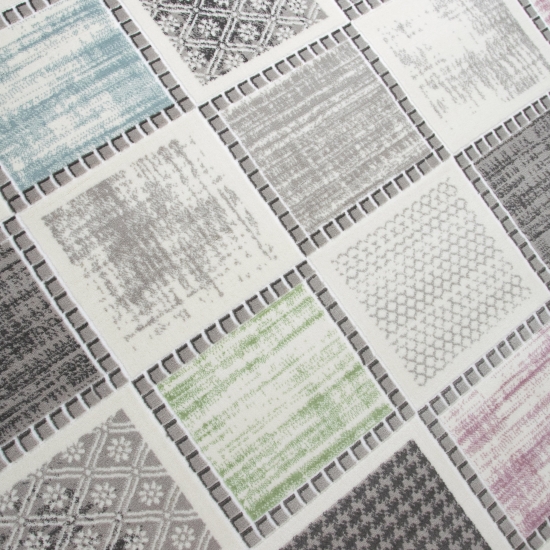 Preview: Designteppich mit grafischem Patch-Design Grau mit dezenten Farbakzenten Preview: Designteppich mit grafischem Patch-Design Grau mit dezenten Farbakzenten