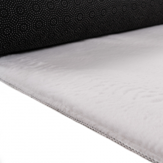 Teppich weiß Hasenfell-Optik elegant weich mit feinem Schimmer modern