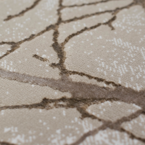 Moderner Designerteppich mit glänzenden Ästen abstrakt beige