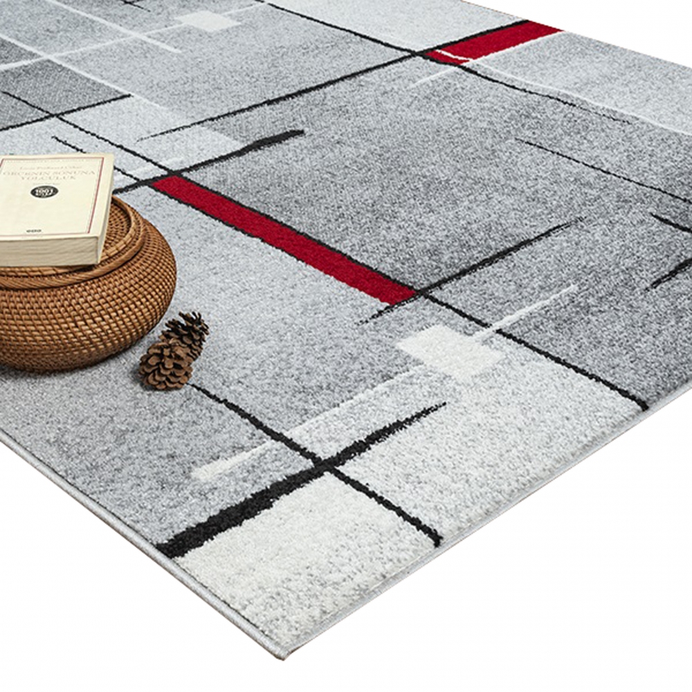 Designerteppich mit grafischem Muster – Grau, Rot & Weiß
