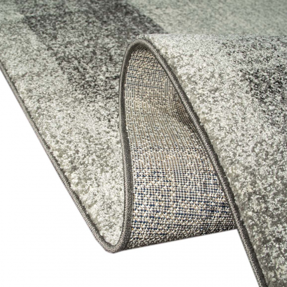 Wohnzimmerteppich Designer Teppich modern kurzflor vintage seitlich gekettelt in grau creme