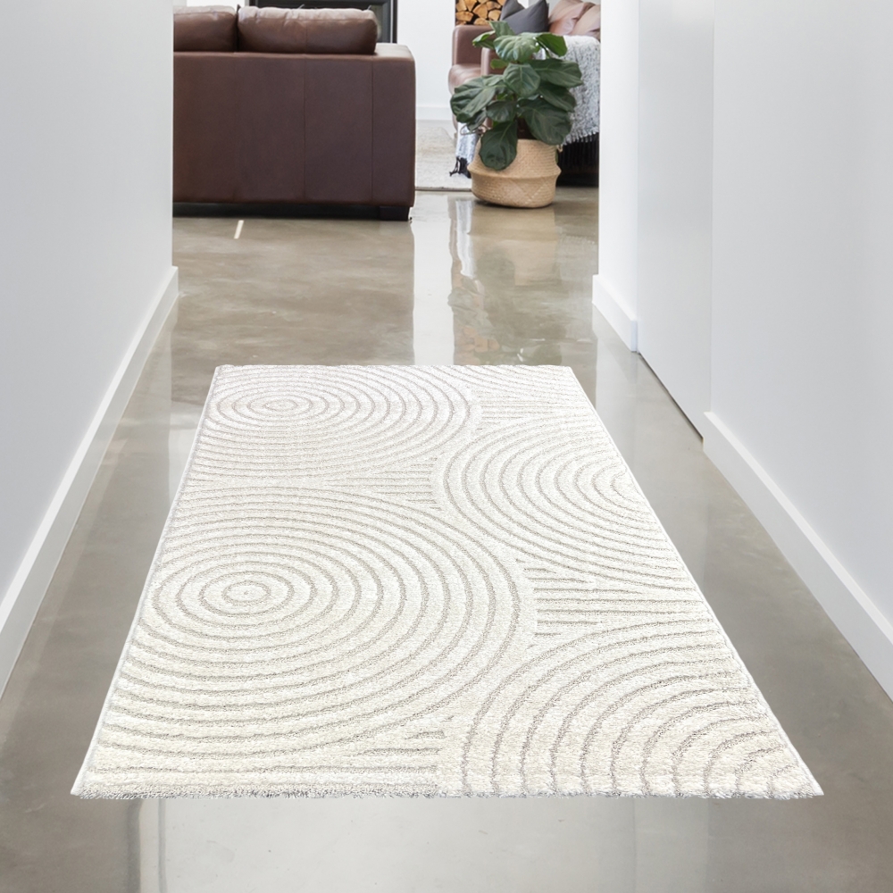 Moderner Wohnzimmerteppich mit elegantem Kreismuster in creme